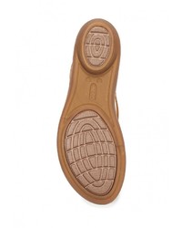 Золотые резиновые сандалии на плоской подошве от Crocs