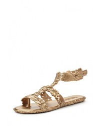 Золотые резиновые сандалии на плоской подошве от Melissa