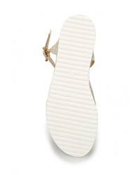 Золотые сандалии на плоской подошве от Coco Perla