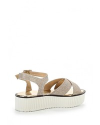 Золотые сандалии на плоской подошве от Coco Perla