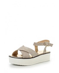 Золотые сандалии на плоской подошве от Coco Perla