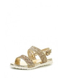 Золотые сандалии на плоской подошве от Donna Moda