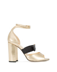 Золотые сатиновые босоножки на каблуке от Chloe Gosselin