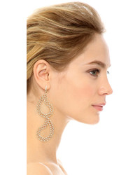 Золотые серьги от Maison Margiela