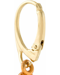 Золотые серьги от Christopher Kane