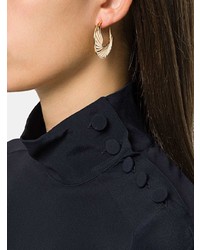 Золотые серьги от Shaun Leane