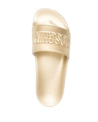 Мужские золотые сланцы от Moschino