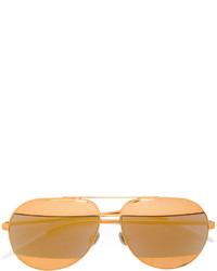 Женские золотые солнцезащитные очки от Christian Dior