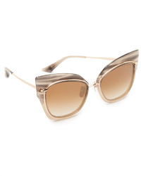 Женские золотые солнцезащитные очки от Dita