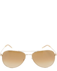 Женские золотые солнцезащитные очки от Oliver Peoples