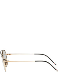 Женские золотые солнцезащитные очки от Thom Browne