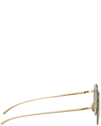 Женские золотые солнцезащитные очки от Maison Margiela