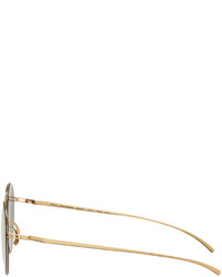 Женские золотые солнцезащитные очки от Maison Margiela