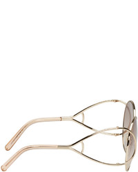 Женские золотые солнцезащитные очки от Chloé