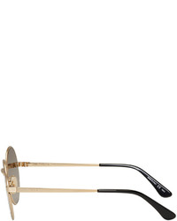 Женские золотые солнцезащитные очки от Saint Laurent