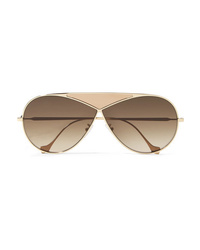 Женские золотые солнцезащитные очки от Loewe