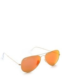 Женские золотые солнцезащитные очки от Ray-Ban