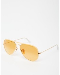 Мужские золотые солнцезащитные очки от Ray-Ban