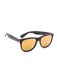 Женские золотые солнцезащитные очки от Saint Laurent