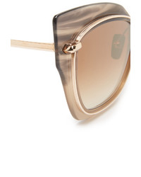 Женские золотые солнцезащитные очки от Dita