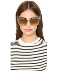 Женские золотые солнцезащитные очки от Dita