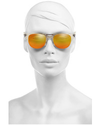Женские золотые солнцезащитные очки от Kenzo