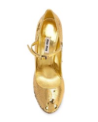 Золотые туфли с пайетками от Miu Miu