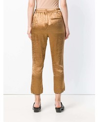 Золотые узкие брюки от Ann Demeulemeester