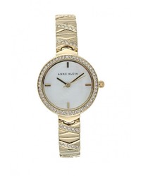 Женские золотые часы от Anne Klein