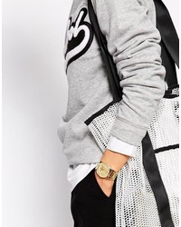 Женские золотые часы от Kenzo