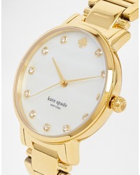 Женские золотые часы от Kate Spade