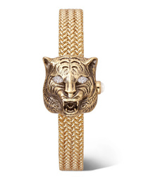 Женские золотые часы от Gucci