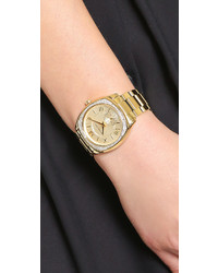 Женские золотые часы от Michael Kors