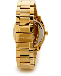 Женские золотые часы от Michael Kors