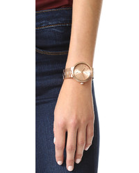 Женские золотые часы от Michael Kors