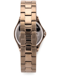 Женские золотые часы от DKNY