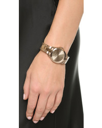 Женские золотые часы от DKNY