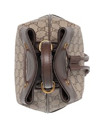 Коричневая кожаная сумка-мешок с принтом от Gucci