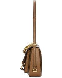 Женская коричневая кожаная сумка от Miu Miu