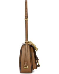 Женская коричневая кожаная сумка от Miu Miu