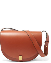Женская коричневая кожаная сумка от Victoria Beckham