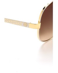 Женские коричнево-золотые солнцезащитные очки от Tory Burch