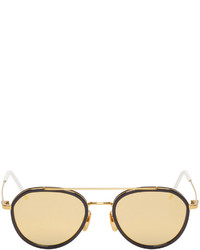 Женские коричнево-золотые солнцезащитные очки от Thom Browne