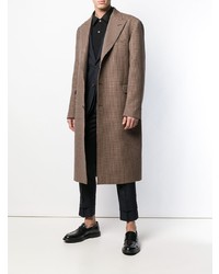 Коричневое длинное пальто в шотландскую клетку от Alexander McQueen