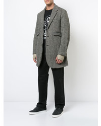 Коричневое длинное пальто от Undercover