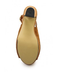 Коричневые замшевые босоножки на каблуке от Sergio Todzi