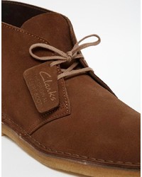 Коричневые замшевые ботинки дезерты от Clarks