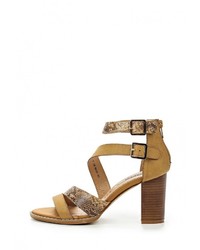 Коричневые кожаные босоножки на каблуке от Raxmax