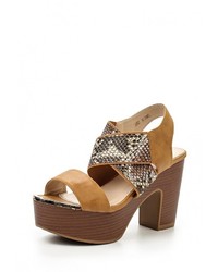 Коричневые кожаные босоножки на каблуке от Sergio Todzi