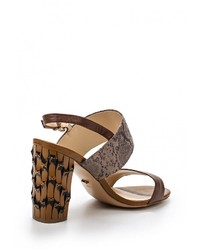 Коричневые кожаные босоножки на каблуке от Vitacci